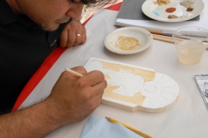Image of Jason painting a retablo